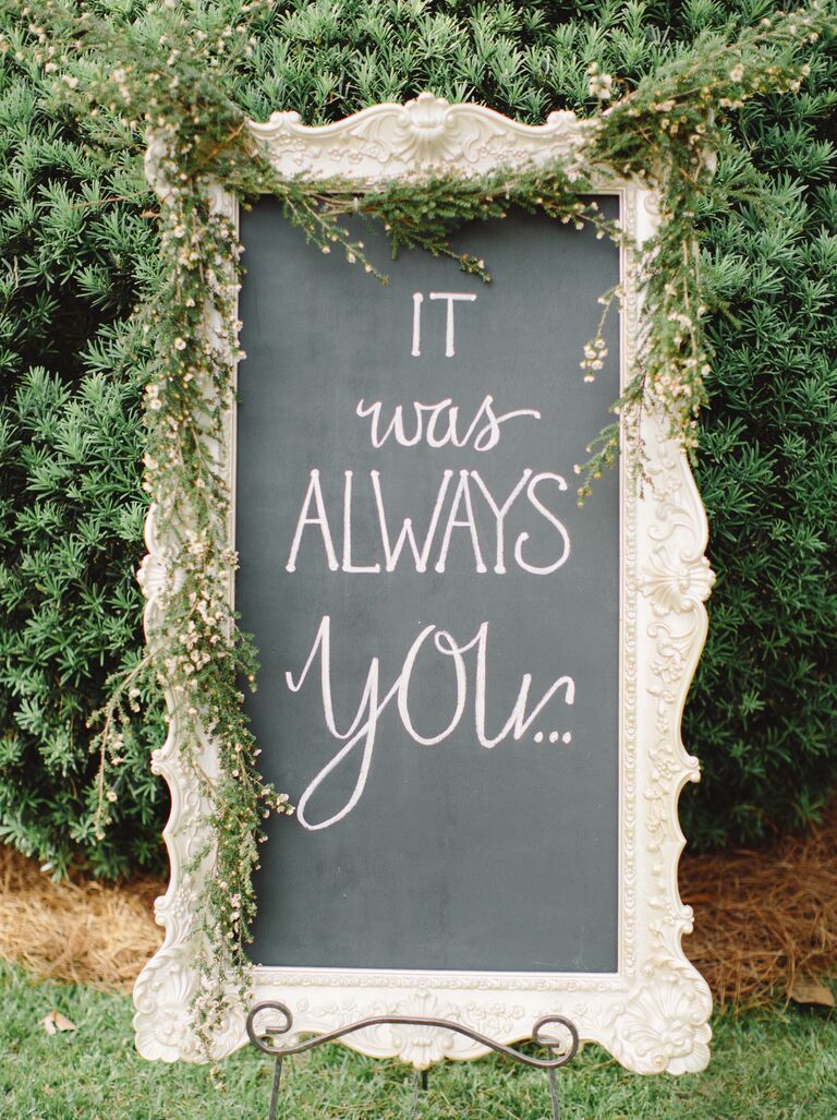 elegant chalkboard wedding sign displaying romantic quote