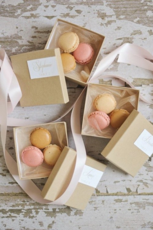 colorful macarons in boxes are a timeless favor idea for a wedding or rehearsal dinner