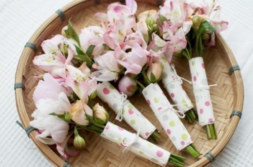 pink blooms wrapped in paper is a fun idea for a spring or summer wedding filled with blooms