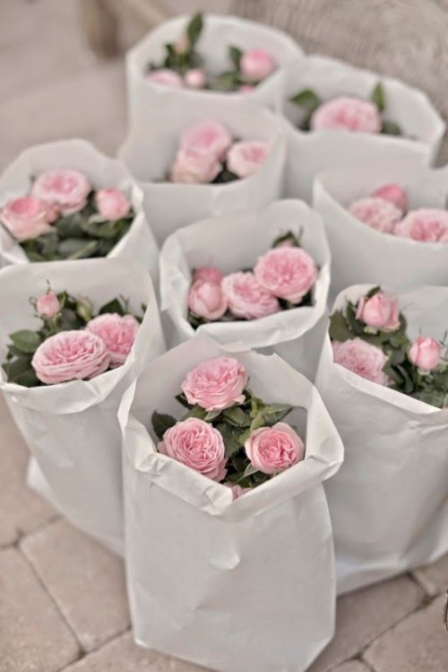 fresh potted peonies or roses are a cool idea for a spring or summer flower-filled rehearsal dinner or wedding
