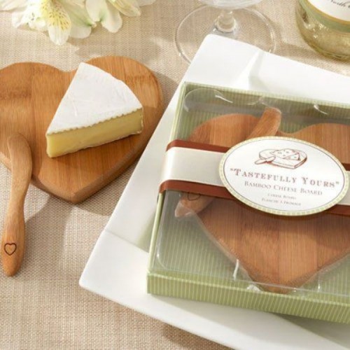 a bamboo cheese board and a matching spreader is a great favor idea if you two love cheese