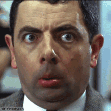 Mr Bean Rowan Atkinson GIF - MrBean RowanAtkinson SillyFace GIFs