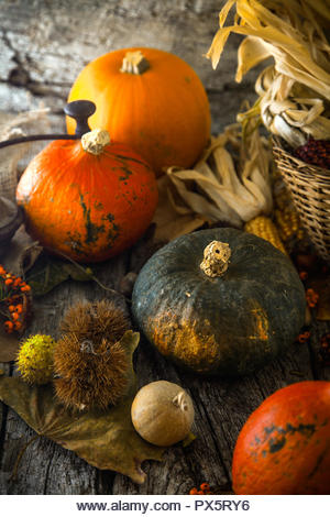 Thanksgiving day dinner. Autumn fruit with leaves. Thanksgiving autumn background - Stock Image