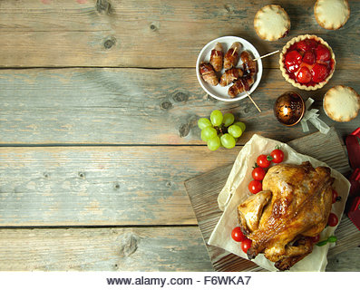 Christmas and thanksgiving savory and sweet food selection on top of a wooden background with copyspace - Stock Image