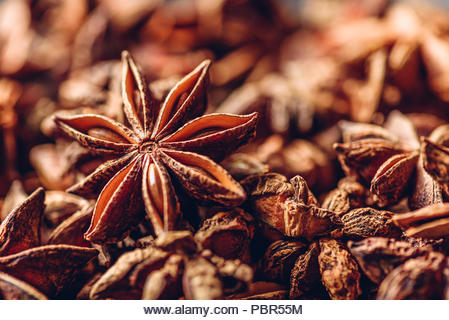 Background of Star Anise Fruits and Seeds. - Stock Image