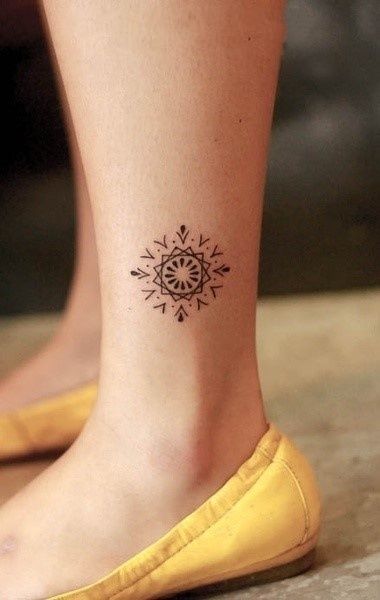 small tattoo ideas for women's legs