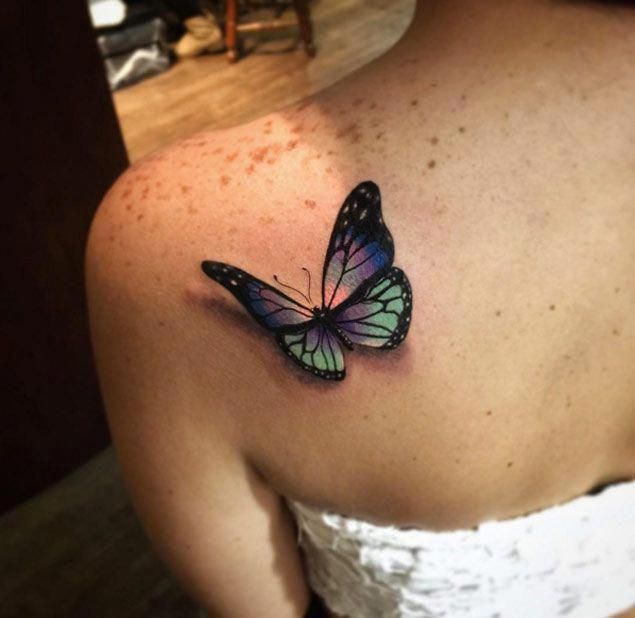 butterfly tattoo meaning lower back