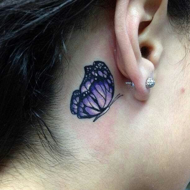 butterfly tattoo under ear