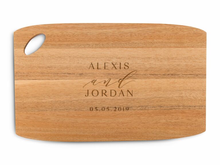 wooden cutting and serving board with oval handle