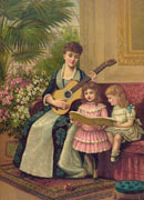 A mother playing guitar while her girls sing Christmas carols