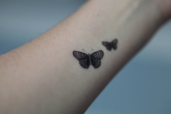 small butterfly tattoos on wrist meaning
