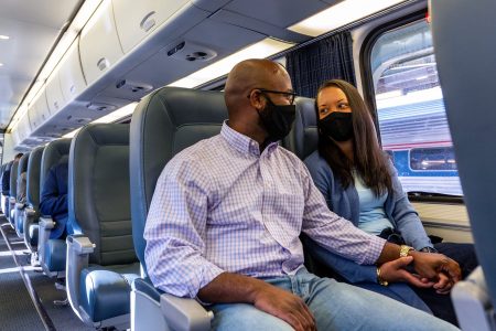 Couple traveling on Amtrak train