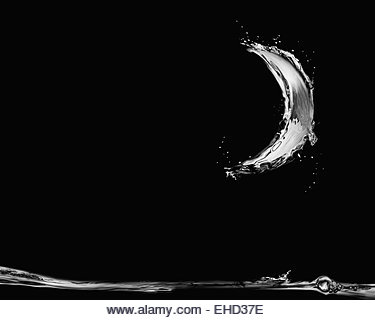 A crescent made of water shining moonlight on the scene. - Stock Image