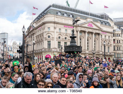 London, UK. 17th Mar, 2021. 17th March 2021. London, UK. Thousands lined the streets of Central London for the annual parade to celebrate the patron saint of Ireland, Patrick. Credit: AndKa/Alamy Live News - Stock Image