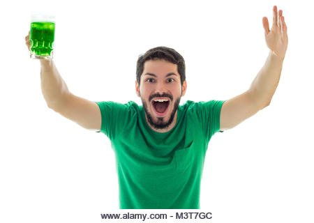 Very enthusiastic for the celebration of St Patrick's. Young man wearing green clothes on white background, - Stock Image