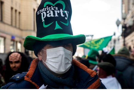 Moscow, Russia. 20th March, 2021. Participants wearing face mask in the St. Patrick's Day Parade held at Arbat street in the center of Moscow during coronavirus COVID-19 pandemic in Russia - Stock Image