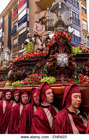 Procession of  Brotherhood  Paso Encarnado at Good Friday procession of Semana Santa (Holy week) in Lorca, province - Stock Image