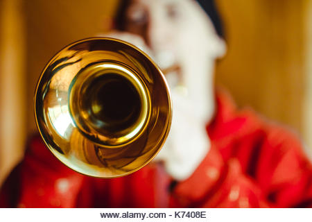 Man playing a trumpet during passion week in Spain - Stock Image