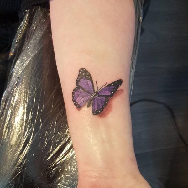 butterfly tattoo on wrist