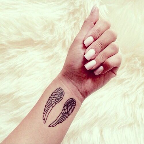 angel wing tattoos for females on wrist