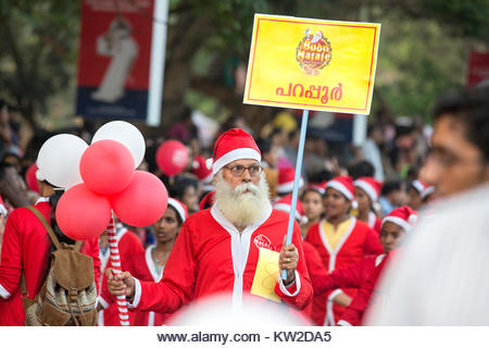 colourfully dressed upon santa's doing flashmob from buon natale christmas fest thrissur 2021,thrissur,kerala,india - Stock Image