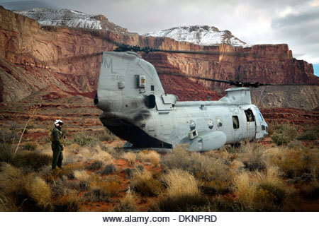 A US Marine Corps CH-46E Chinook helicopter sits in the bottom of the Grand Canyon during Toys For Tots Operation Havasupai delivering Santa Claus and toys to children of the Havasupai Indian tribe December 14, 2011 in Supai, AZ. - Stock Image