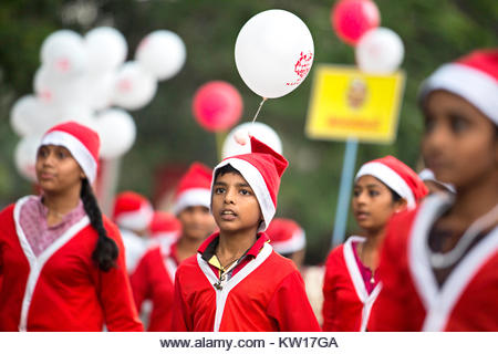 colourfully dressed upon santa's doing flashmob from buon natale christmas fest thrissur 2021,thrissur,kerala,india - Stock Image