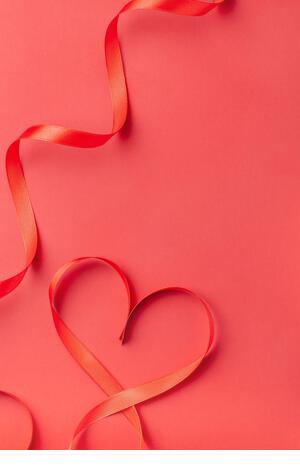 Valentine's day concept. Handmade red hearts on a dark background. With place for your text. - Stock Image