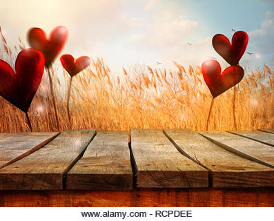 Valentines day. Valentines background with table and bokeh. Love red background. Valentines day empty display - Stock Image