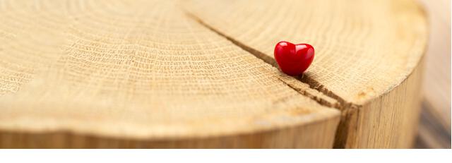 Valentines Day background with hearts. Red heart on old wood. Holidays card with copy space. - Stock Image