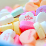 Bowl of candy hearts with sayings.