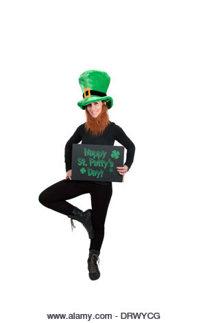 A leprechaun with a sign saying Happy St Patty's day - Stock Image