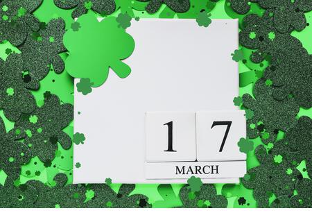 Happy St Patrick's day. White wood calendar blocks with the date March 17th. - Stock Image