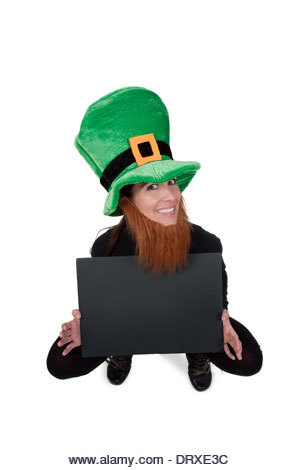 A leprechaun with a a blank sign where text can be added - Stock Image
