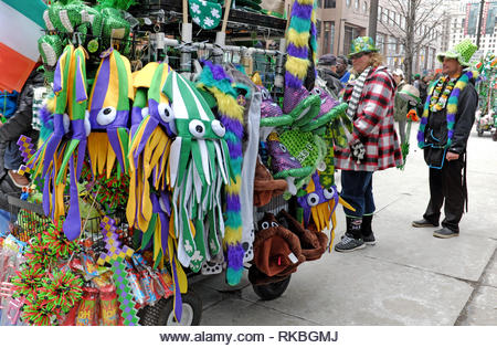 Cart filled with St. Patrick's Day regalla and souvenirs in downtown Cleveland, Ohio, USA during the 2021 St. Patrick's Day parade and festivities. - Stock Image
