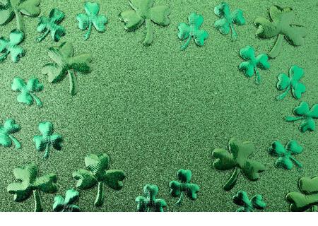 Elegant and shiny St. Patricks Day background. Green glitter and clover - Stock Image