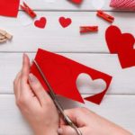 TikTok user Lauren Campanella's scratch-off Valentine's Day card idea helps DIYers create interactive holiday stationery using construction paper, stickers, pencils, markers, paint, liquid dish soap, and white crayons.